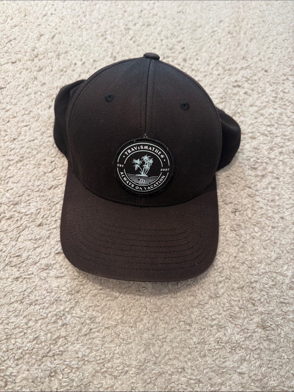 TravisMathew Black Palm Logo Baseball Cap